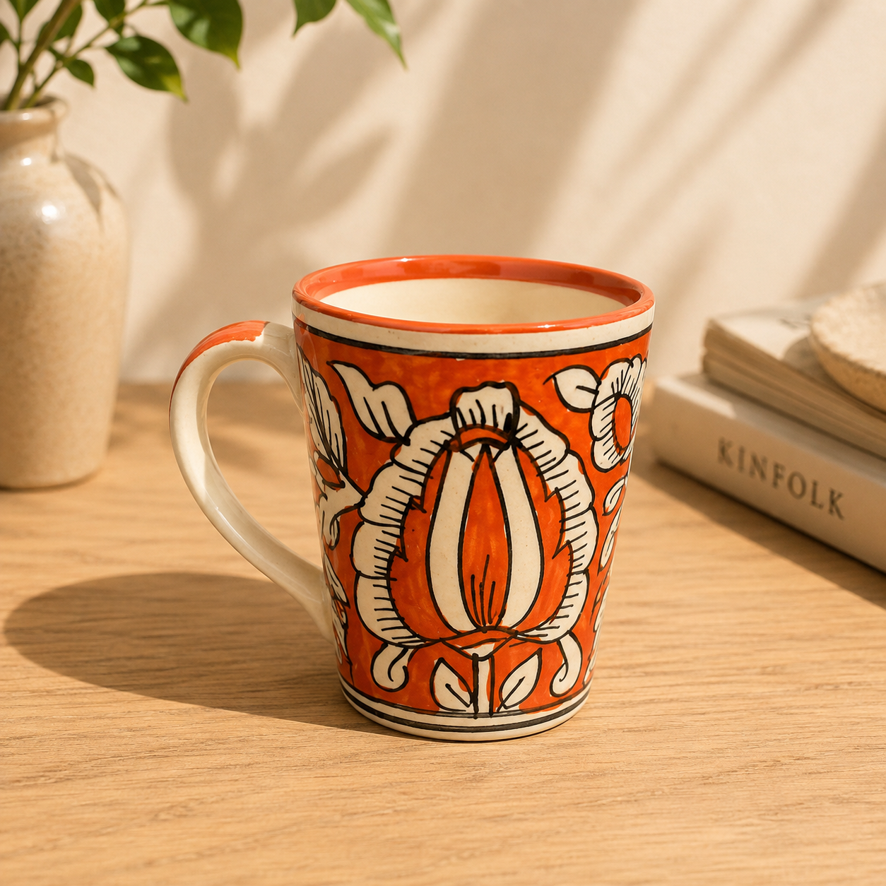 Orange mughal ceramic cup