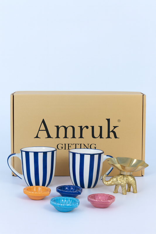 Studio Pottery 7 Piece Diwali Gift Box ( 2 Cups + 4 Diya's +Metal Elephant Tea light Holder + Diwali Card )