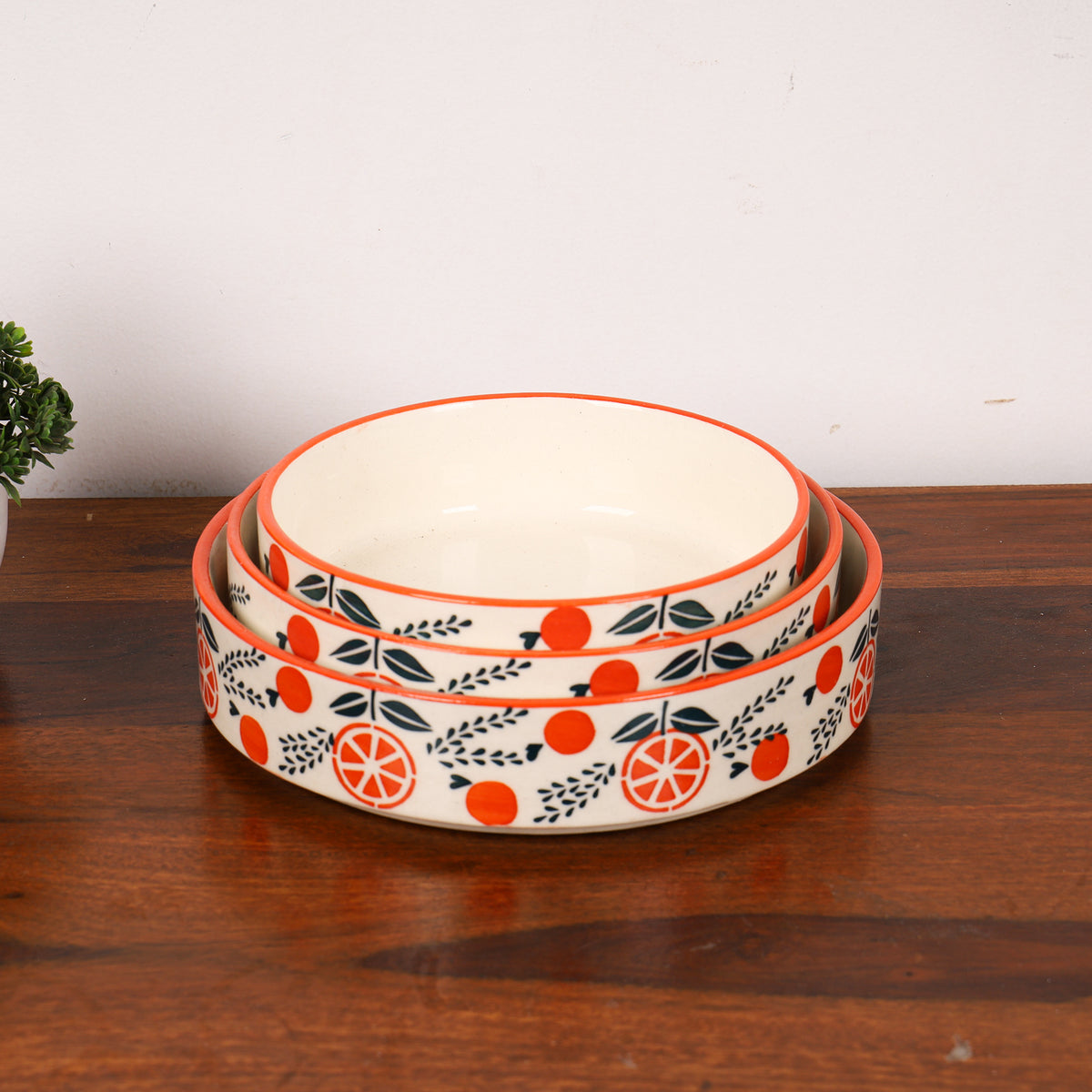 Orangina ceramic flat bowls