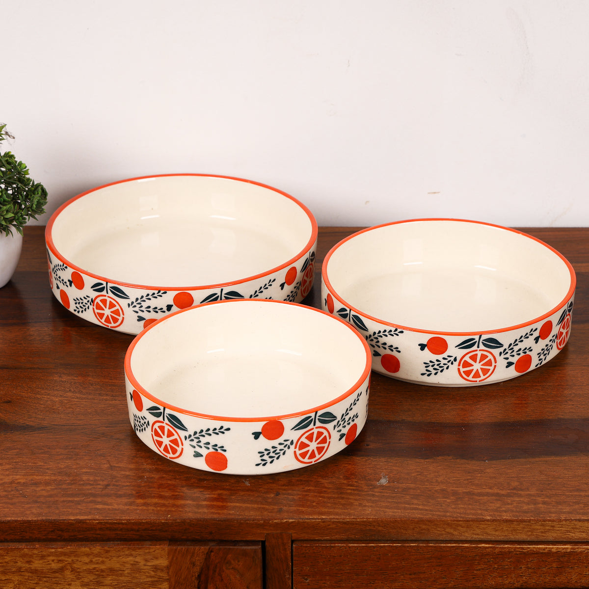 Orangina ceramic flat bowls