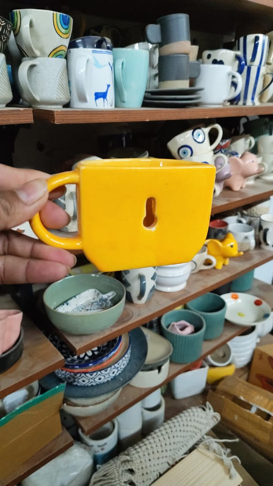 Yellow key hole planter